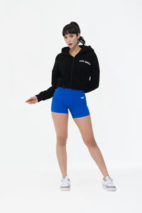 Black crop fleece hoodie front view on model